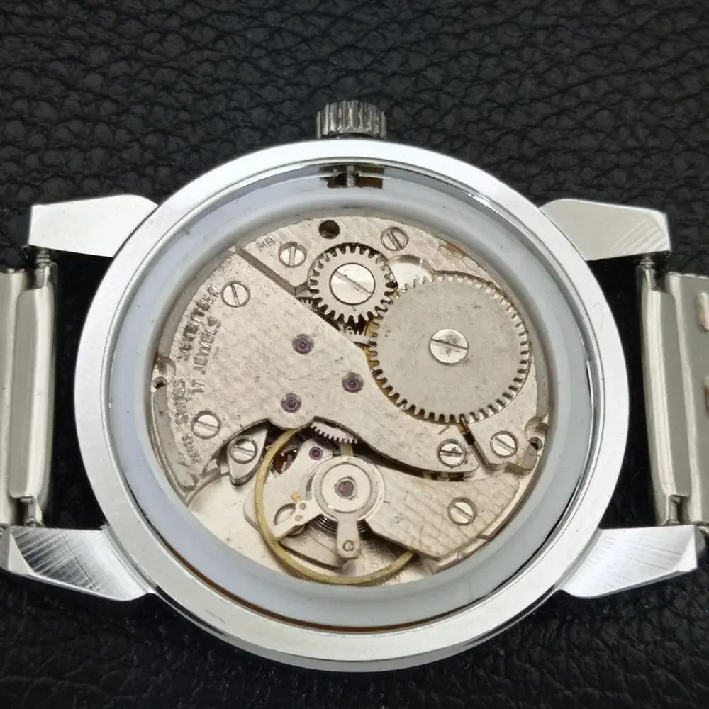 Vintage 1971 Roulette Manual Mens Silver Watch W/Steel Strap & Yellow accents